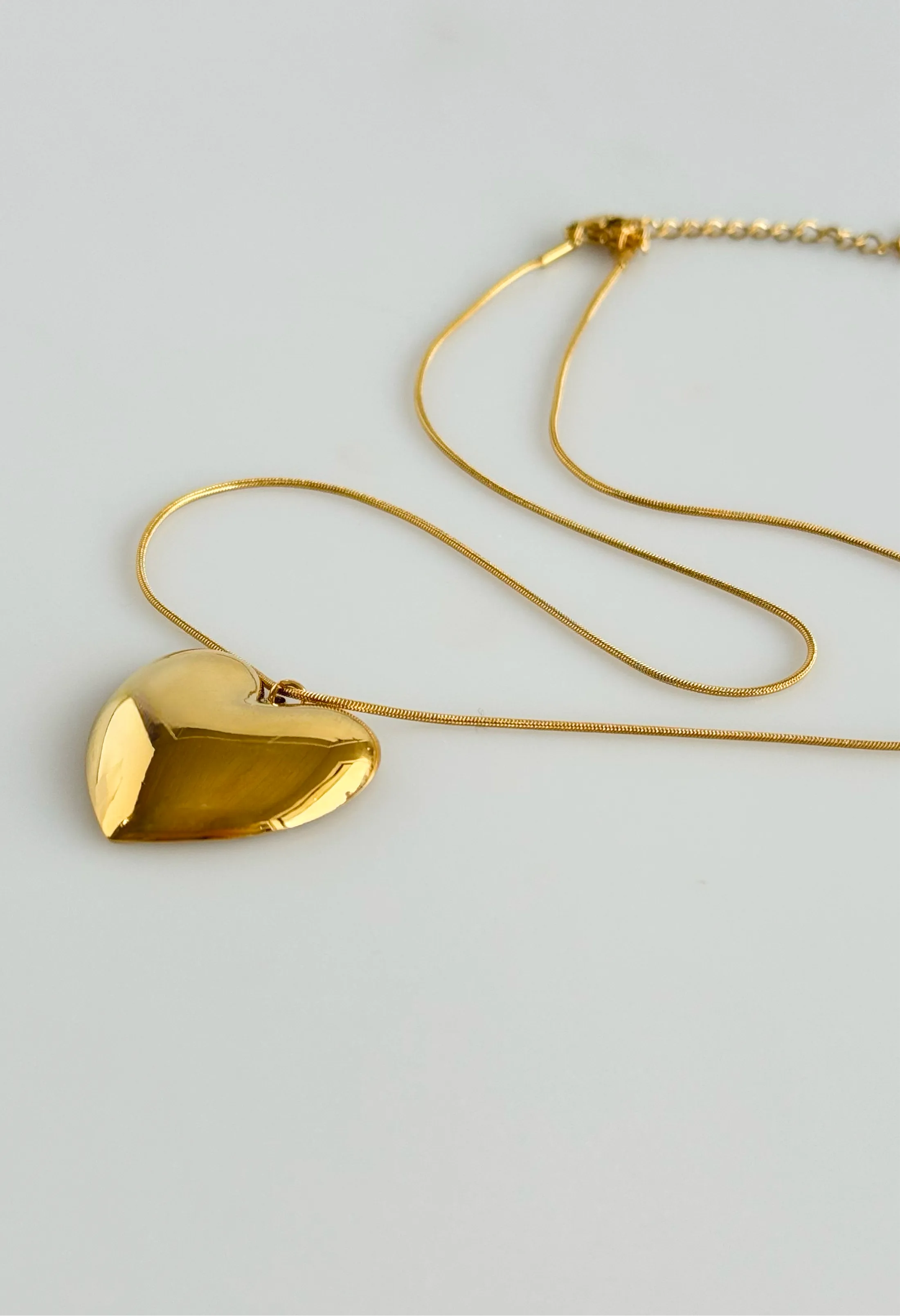 Golden Heartbeat Pendant Necklace