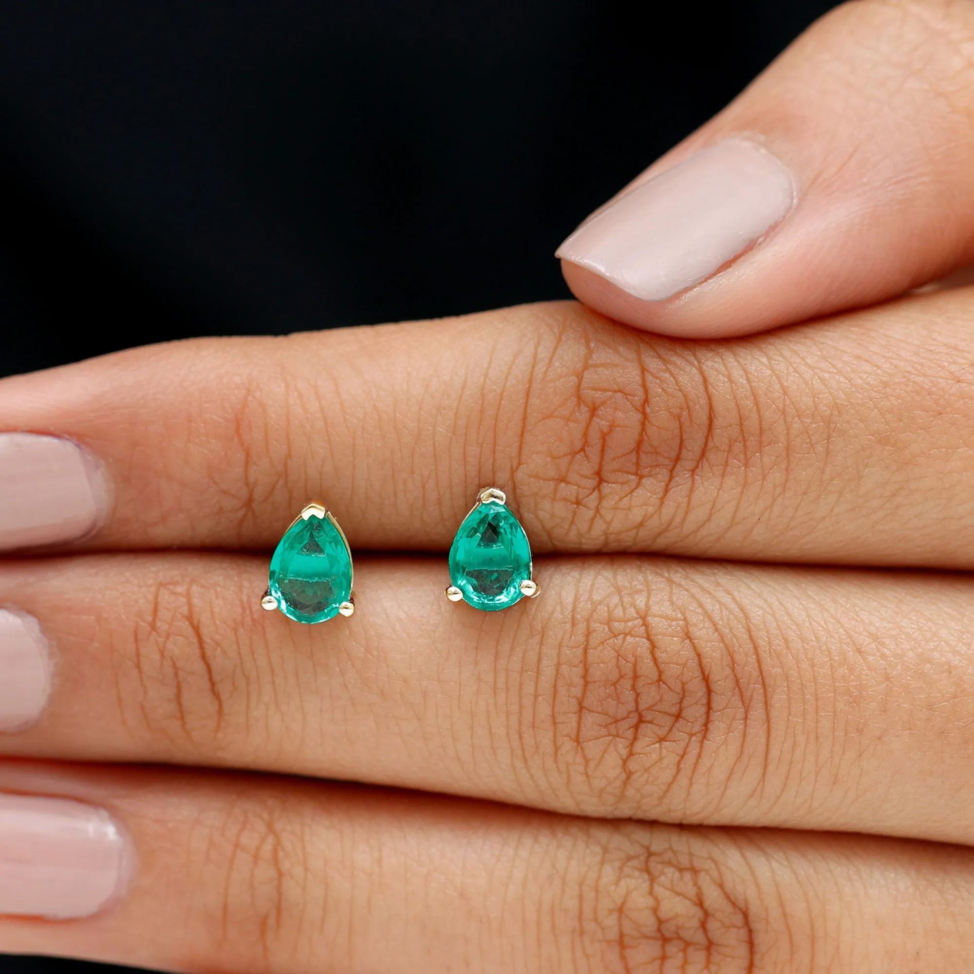 Pear Cut Lab Grown Emerald Solitaire Stud Earrings in 3 Prong Setting