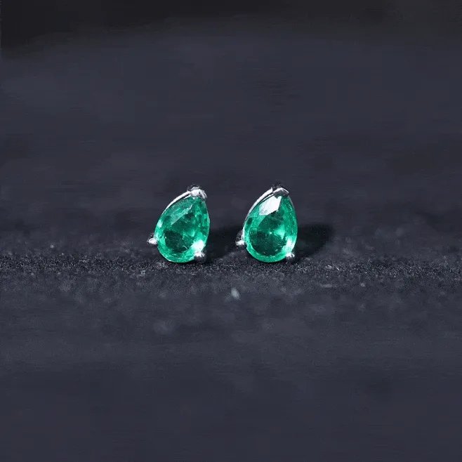 Pear Cut Lab Grown Emerald Solitaire Stud Earrings in 3 Prong Setting