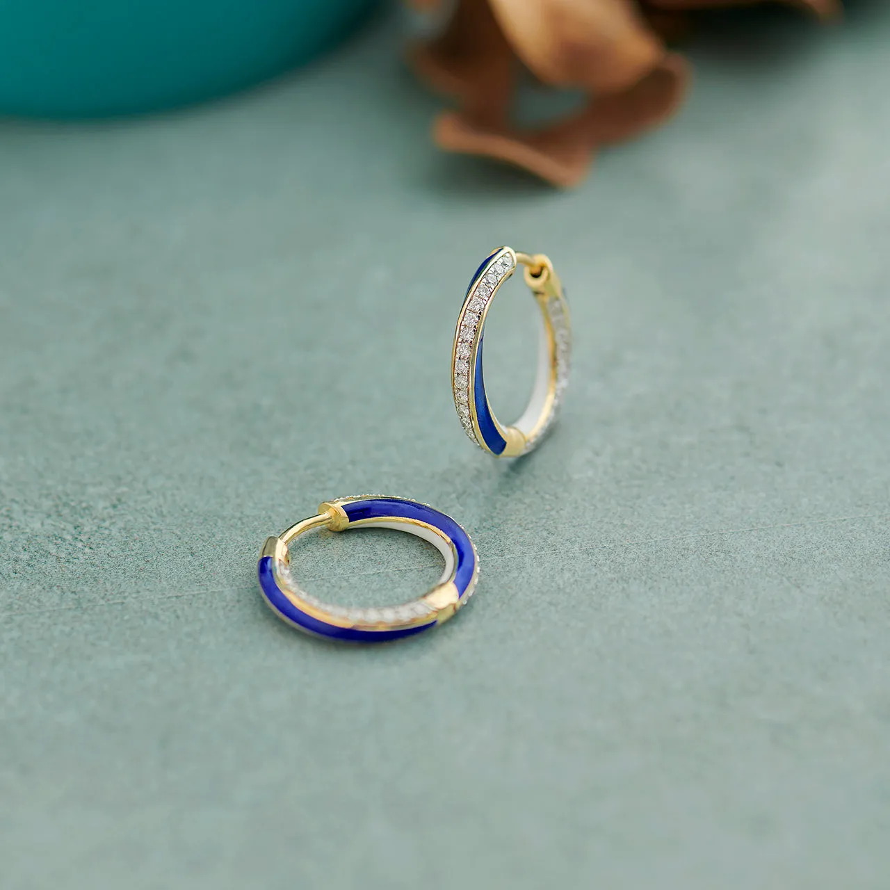 Twisted Blue Cera Diamond Hoops